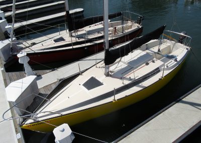 Many boats moored on the shore